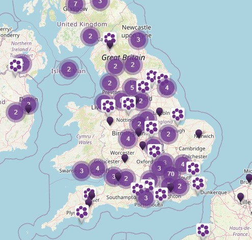 Map of the UK covered in purple pins.